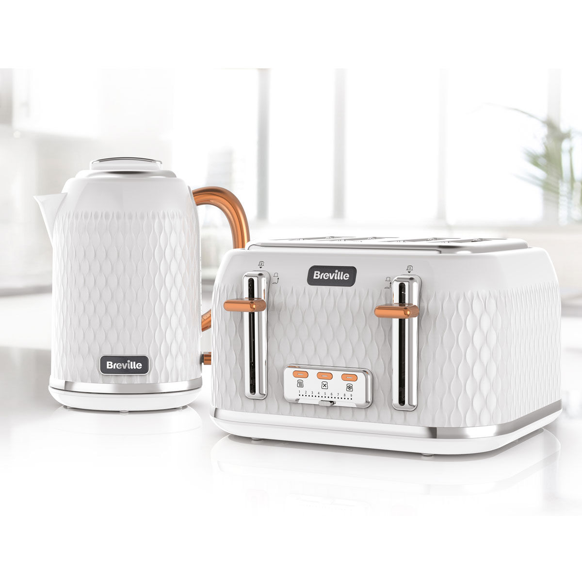 chrome kettle toaster and microwave